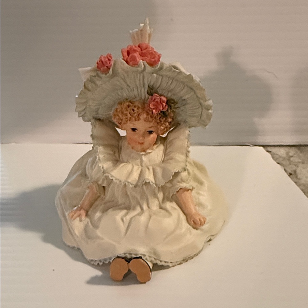 Vintage Porcelain Girl Figurine in Cream Dress with Pink Roses